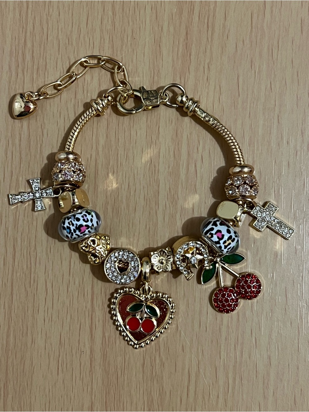 Gold-Tone Charm Bracelet with Red Cherry & Leopard Bead Accents